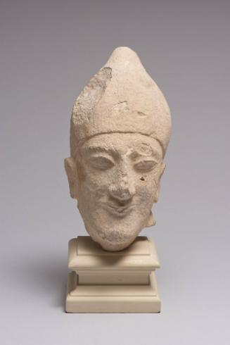 Head with Conical Helmet from a Male Votary