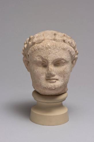 Head of Beardless Male Votary with Laurel Wreath