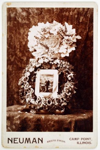 Funerary Wreath Floral Arrangement with a Portrait of the Deceased in the Center