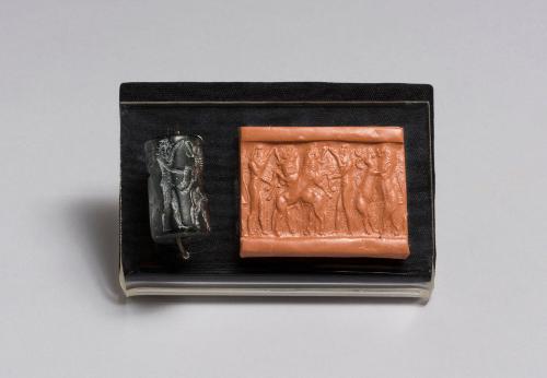 Akkadian Cylinder Seal with Two Heroes Attacking Two Bulls