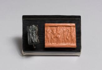 Akkadian Cylinder Seal with Two Heroes Attacking Two Bulls