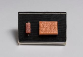 Neo-Assyrian Cylinder Seal with Seated Deity and Worshippers