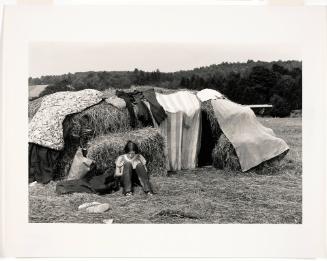 Woodstock (Girl Sitting in Front of Hay Bale Hut)