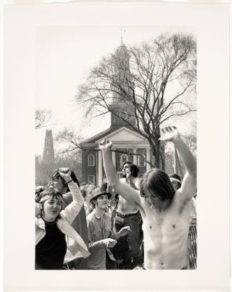 Untitled (Shirtless Male Demonstrator with Arms Raised, Smoking Cigarette)