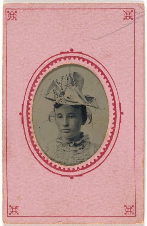 Portrait of a Young Woman Wearing a Hat