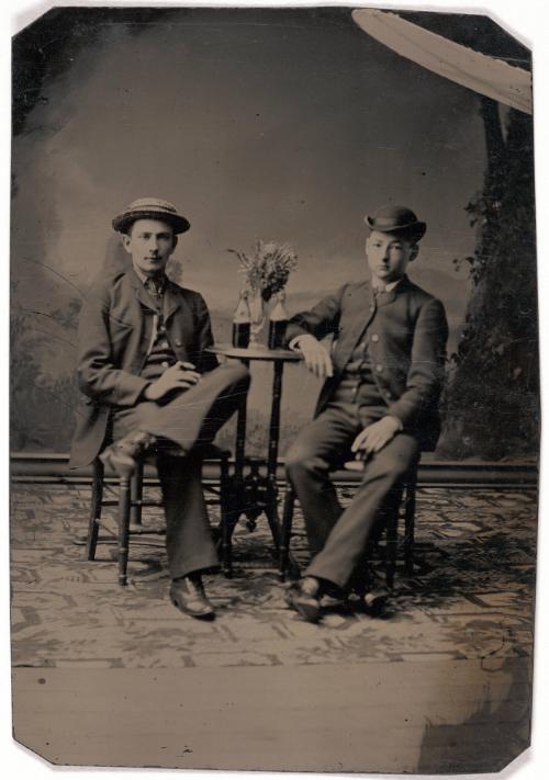 Portrait of Two Men at a Table