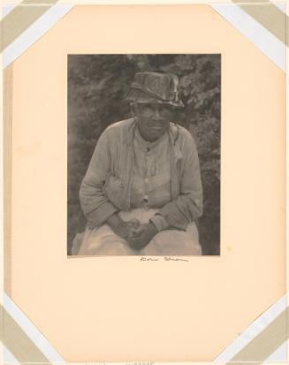 Black Woman, Seated, Holding Her Hands