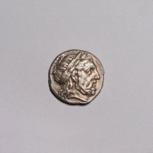 Tetradrachm: Laureate Head of Zeus Right; Youth With Palm Branch On Horseback Prancing Right, Aplustre and Pi Below on Reverse