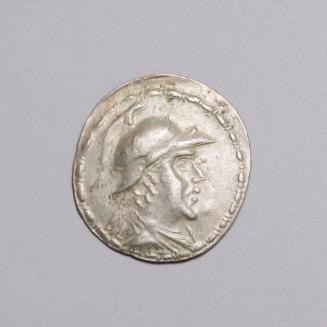 Tetradrachm: Diademed and Draped Bust Right, Wearing Crested Helmet Ornamented with Bull's Horn and Ear, with Fillet Border; Dioskouroi on Horseback Prancing Right, Each Holding Spear and Palm, Monogram in Lower Field to Right on Reverse