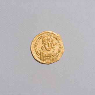 Solidus: Helmeted and Cuirassed Bust of Justinian I Facing, Holding a Scepter and Shield; Victory Standing Facing, Holding a Long Cross and Globus Cruciger on Reverse