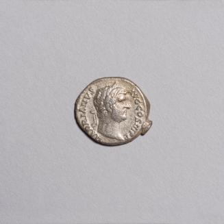 Hadrian Denarius (Obverse: Laureate Head of Hadrian Facing Right; Reverse: Pietas Standing Left Holding Arms Aloft in Prayer before Altar)