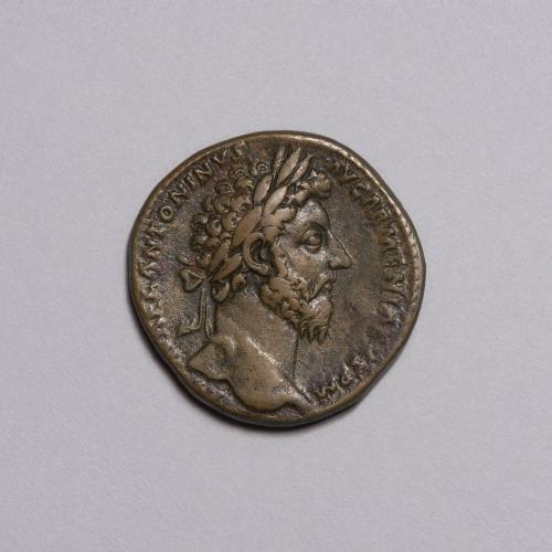 Sestertius: Laureate Bust of Marcus Aurelius Right; Mars Standing Right, Holding Spear and Leaning on Shield on Reverse