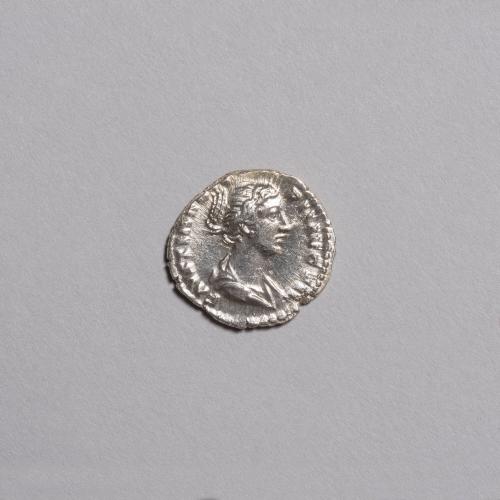 Denarius: Draped Bust of Faustina Jr. Right, High Bun; Concordia Seated Left on Low Seat, Holding Flower, Resting Left Elbow on Cornucopiae Set on Globe below Seat on Reverse