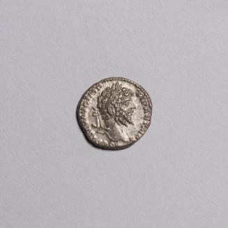 Denarius: Laureate Head of Septimius Severus Right; Victoria Flying Left, Holding Wreath over Shield Set on Base on Reverse