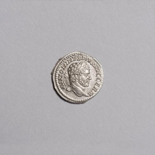 Denarius: Laureate Bearded Head of Caracalla Right; Liberalitas Standing Left Holding Cornucopiae and Abacus on Reverse