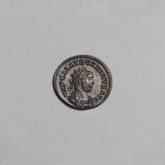 Antoninianus: Radiate Draped and Cuirassed Bust of Carinus Right; Carinus Standing Right in Armor Holding Spear and Globe, D to Right on Reverse