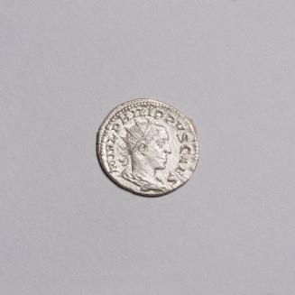 Antoninianus: Radiate Draped and Cuirassed Bust of Philip II Right; Jupiter Standing Half-Left, Naked, Cloak Hangs from Left Shoulder, Holding Torch and Spear on Reverse
