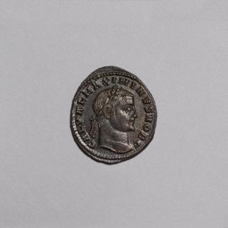 Follis: Laureate Head of Maximinus II Right; Genius Nude/Draped on Shoulders Standing Left, Puring Libation and Holding Cornucopiae on Reverse