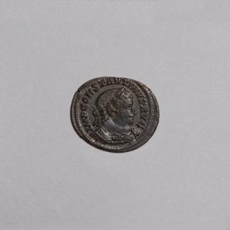 Follis: Laureate and Cuirassed Bust of Constantine I Right; Sol Standing Nude Left, Radiate Crown, Left Shoulder Draped, Holding Globe, PTR in Exergue, T - F in Field on Reverse