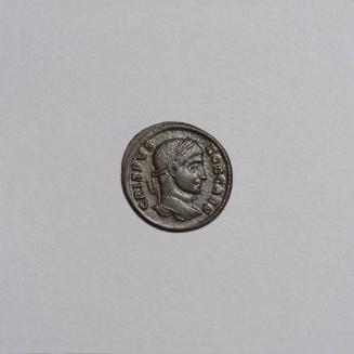 AE3: Laureate Head of Crispus Right; Laurel Wreath around VOT X (with a Dot above the X), T*AR in Exergue on Reverse