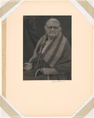 Old Woman Seated Wearing Glasses and Shawl