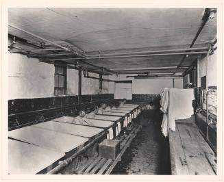 Men Bathing in a Welfare Shelter