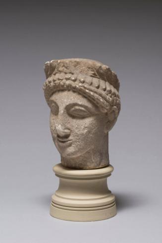 Head of Beardless Male Votary with Laurel Wreath