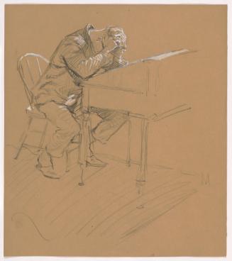 Man Leaning Over Desk