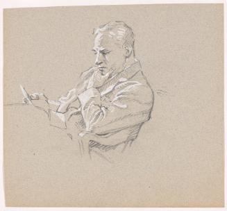 Seated Man Holding Object