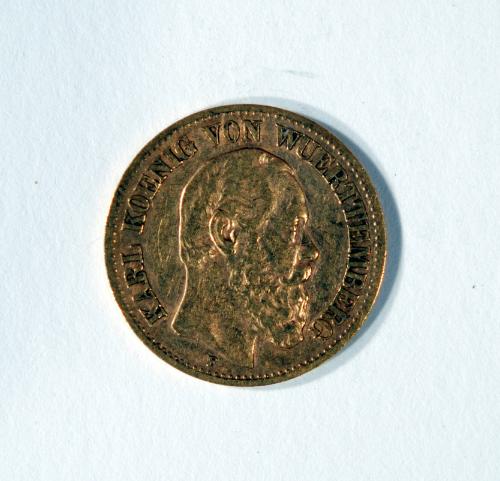 10 Mark Coin with Profile Portrait of King Karl of Woerttemberg (obverse) and Spread-winged Eagle with Crown and Banner Overhead (reverse)