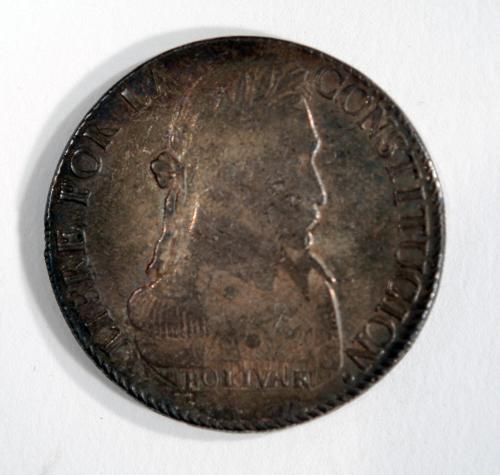 Coin with Profile Image of Simon Bolivar (obverse) and Tree with Llamas (reverse)