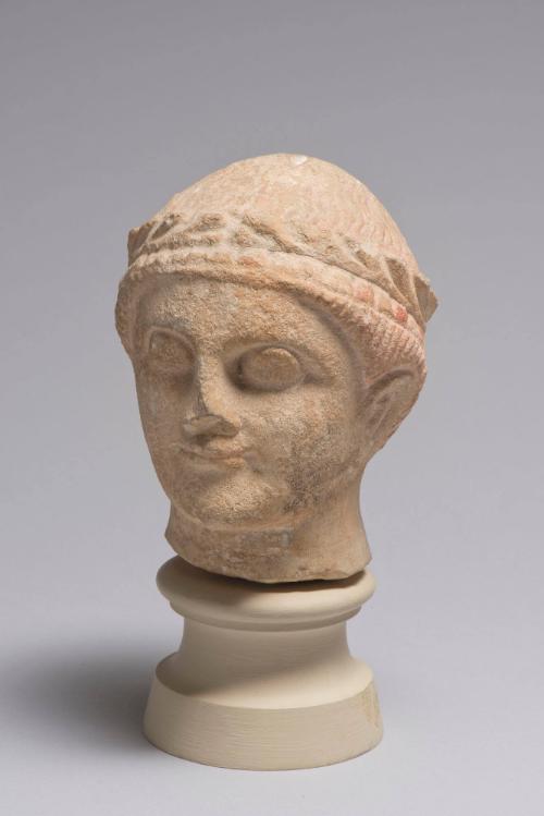 Head of Beardless Male with Laurel Wreath