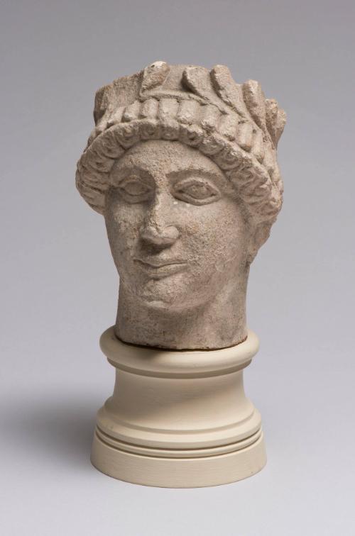 Head of Beardless Male Votary with Laurel Wreath