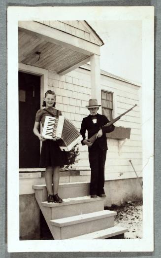 Children with Accordion and Gun