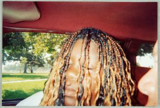 Girl with Eyes Closed in Car