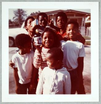 African American Kids with Photo in Hand
