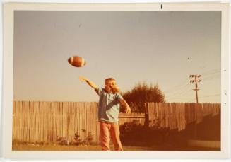 Girl Throwing Football