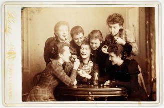 A Group of Seven Women Eating Cherries