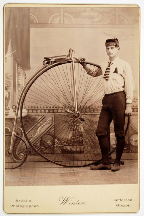 A Man with his Penny-Farthing