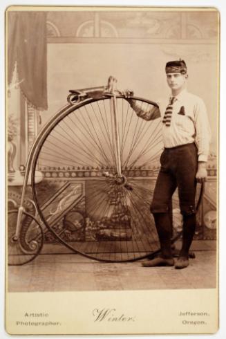 A Man with his Penny-Farthing