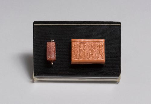 Neo-Assyrian Cylinder Seal with Seated Deity and Worshippers