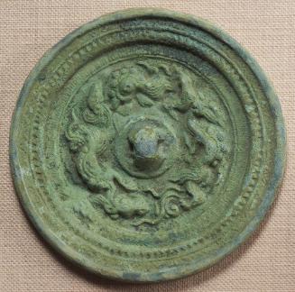 Circle-shaped Mirror Decorated with Dragon Motifs