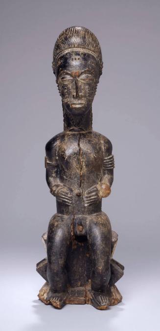 Seated Male Figure