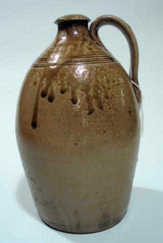 One handled salted glazed jug
