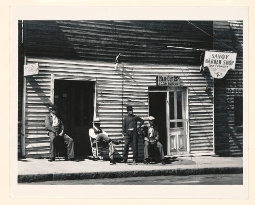 Vicksburg Negroes and shop front. Mississippi